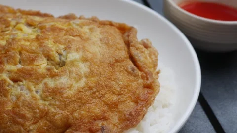 Thai Fried Egg with Minced Pork Over Rice Stock Footage 328206340