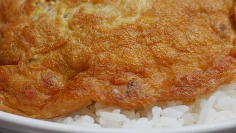 Thai Fried Egg with Minced Pork Over Rice Stock Footage 328274641