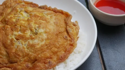 Thai Fried Egg with Minced Pork Over Rice Stock Footage 328620888