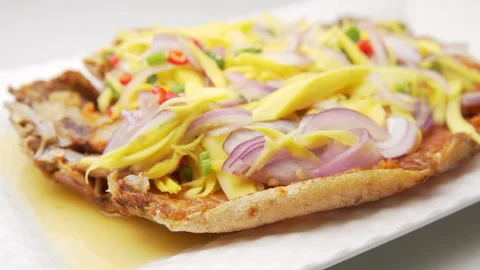 Thai Fried Fish with Mango Salad Stock Footage 146292345