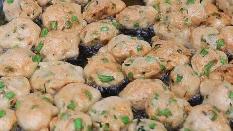 Thai fried fish-paste balls with hot oil in big pan, Thai street food. Stock Footage 82290424