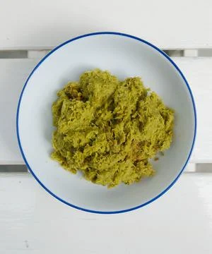 Thai Green curry paste in a white bowl Stock Photos