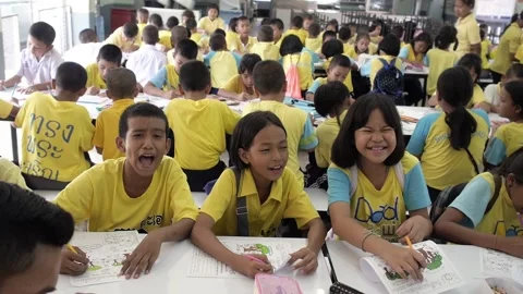 Thai group of students enjoying drawing activity in classroom happy smiling Stock Footage 157700966