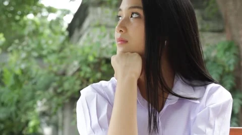 Thai high school student uniform teen beautiful girl happy and relax Stock Footage 68335669