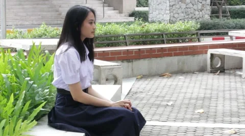 Thai high school student uniform teen beautiful girl happy and relax Stock Footage 68340137