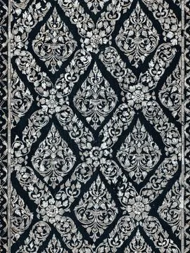 Thai Lacquer Gilded Door Panel with Intricate Gold Floral Diamond Pattern Stock Photos