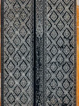 Thai Lacquer Gilded Door Panel with Intricate Gold Floral Diamond Pattern Stock Photos