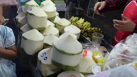 Thai Lady Opens Coconut in Chiang Mai Stock Footage 279085211