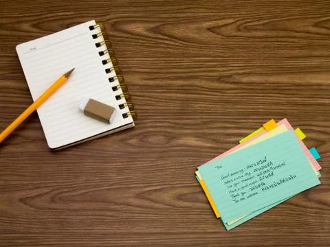 Thai; Learning New Language Writing Words on the Notebook Stock Photos