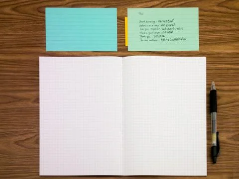 Thai; Learning New Language Writing Words on the Notebook Stock Photos