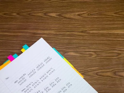 Thai; Learning New Language Writing Words on the Notebook Stock Photos