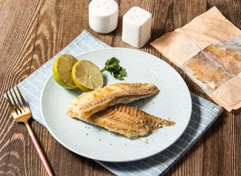 Thai Lime Shufei Snapper fish with red chilli served in plate isolated on n.. Foto stock