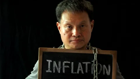 Thai man with inflation  board, in studio Chiangmai  Thailand. Stock Footage 200443151