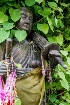Thai monk statue in temple Stock Photos