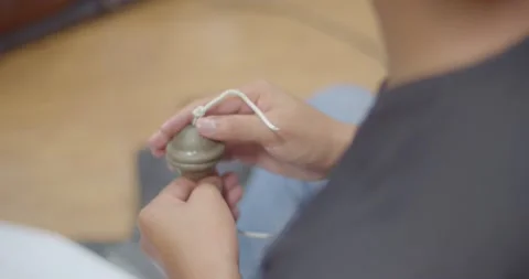 Thai musical instruments.Small cup-shaped cymbals provide a consistent rhythm Stock Footage 222947291