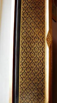 Thai native art pattern on wood window church, Thailand. Stock Photos