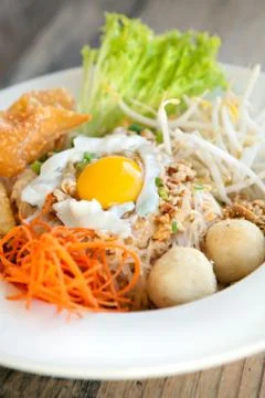 Thai Noodle Dish with Fried Egg Stock Photos