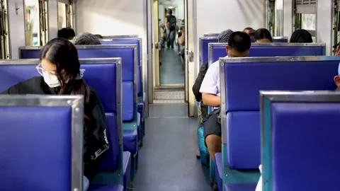 Thai Passengers Commuting on a Crowded Train in Bangkok Thailand Video stock 328391835