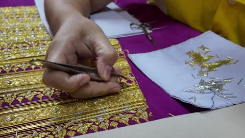 Thai patterns embroidery work with gold metallic yarn, Stock-Footage 276971118