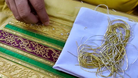Thai patterns embroidery work with gold metallic yarn, Stock-Footage 276971224