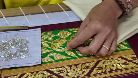 Thai patterns embroidery work with gold metallic yarn, Stock Footage 276971235