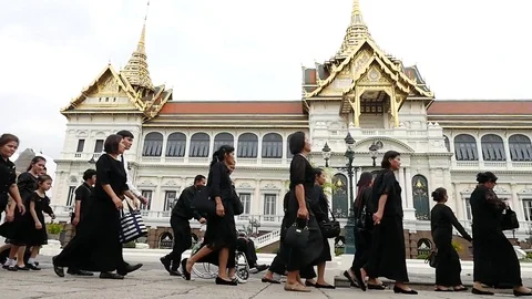 Thai people are walking to attend the funeral King Bhumibol Adulyadej in Palace Stock Footage 74642777