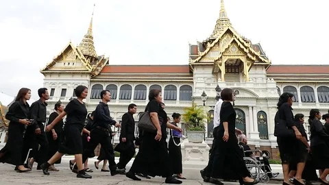 Thai people are walking to attend the funeral King Bhumibol Adulyadej in Palace Stock Footage 74642795