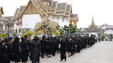 Thai people are walking to attend the funeral King Bhumibol Adulyadej in Palace Stock Footage 74684868