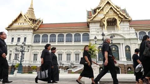 Thai people are walking to attend the funeral King Bhumibol Adulyadej in Palace Stock Footage 74684891