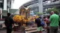 Thai people near mini buddhist temple in Bangkok, Thailand HD Footage