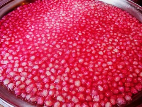 Thai Pink Ruby Dessert with Syrup in Steel Bowl 스톡 사진