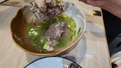 Thai Pork Bone Soup with Green Onions in Bangkok 動画素材 342691136