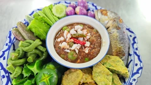 Thai shrimp paste chili dip with fried mackerel and vegetables. Stock Footage 342403125