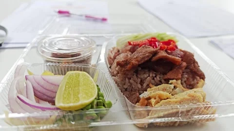 Thai shrimp paste rice (Khao Kluk Kapi) in a delivery box. 動画素材 348156458