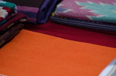 Thai silk is woven using ancient methods of weaving. No machinery Is the trad Stock Photos