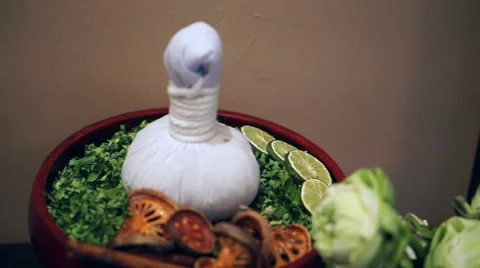 Thai spa accessories setting with candles and herbs Stock Footage 54587293