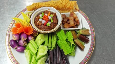 Thai spicy chili paste Nam Phrik Long Ruea with sweet pork and vegetables. Stock Footage 343209239
