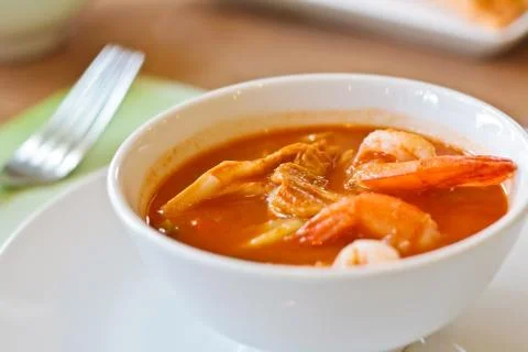 Thai spicy soup on white cup. Stock Photos
