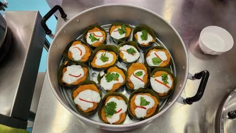 Thai steamed fish with curry paste Stock Photos
