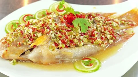 Thai steamed ruby fish with spicy lime and chili sauce. Stock Footage 342394830