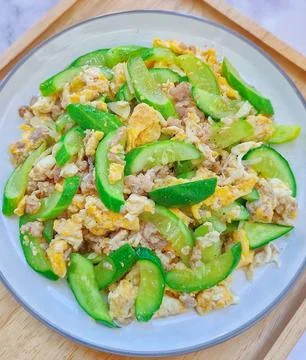 Thai Stir-Fried Cucumber with Egg and Minced Pork Stock Photos