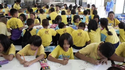 Thai students enjoying drawing activity lesson in classroom full of happiness Stock Footage 157700885
