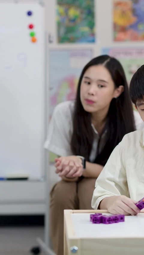 Thai Students Learning Math with Plastic Building Blocks in Classroom Stock Footage 334992004