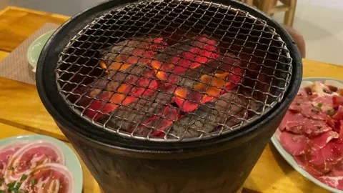 Thai style coal-grilled beef BBQ dinner Stock Footage 143894158