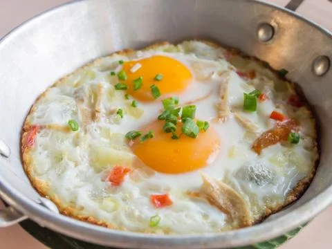 Thai style fried egg Stock Photos
