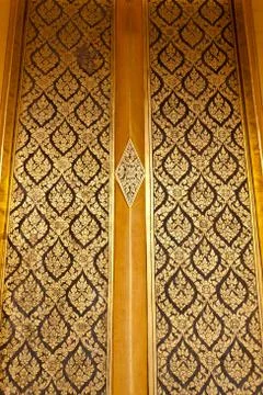 Thai style of pattern on door temple Stock Photos