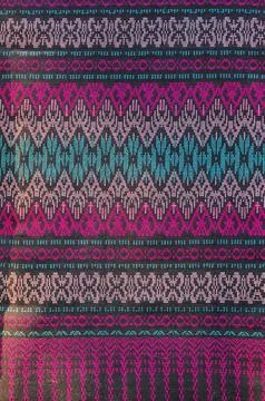 Thai style pattern fabric close up background. Stock Photos