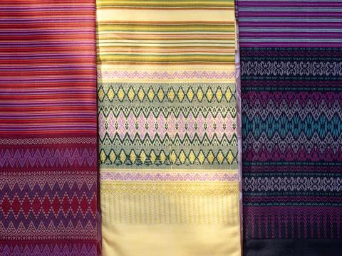 Thai style pattern fabric close up background. Stock Photos