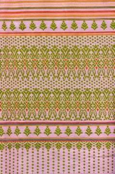 Thai style pattern fabric close up background. Stock Photos