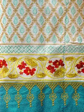 Thai style pattern fabric close up background. Stock Photos